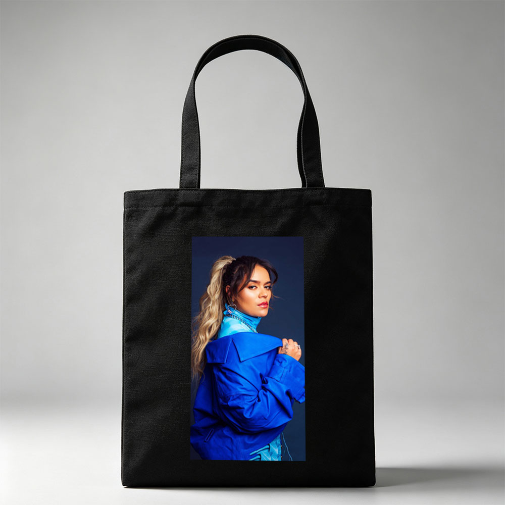 Rita Ora in Bold Blue Fashion Pose Against Dark Background - Canvas tote bags