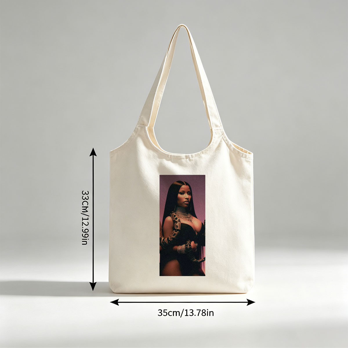 Nicki Minaj in a Dramatic Pose with a Snake Wrapped Around Her Arm and Neck, Wearing a Black Outfit and Heavy Jewelry - Canvas shoulder bags/