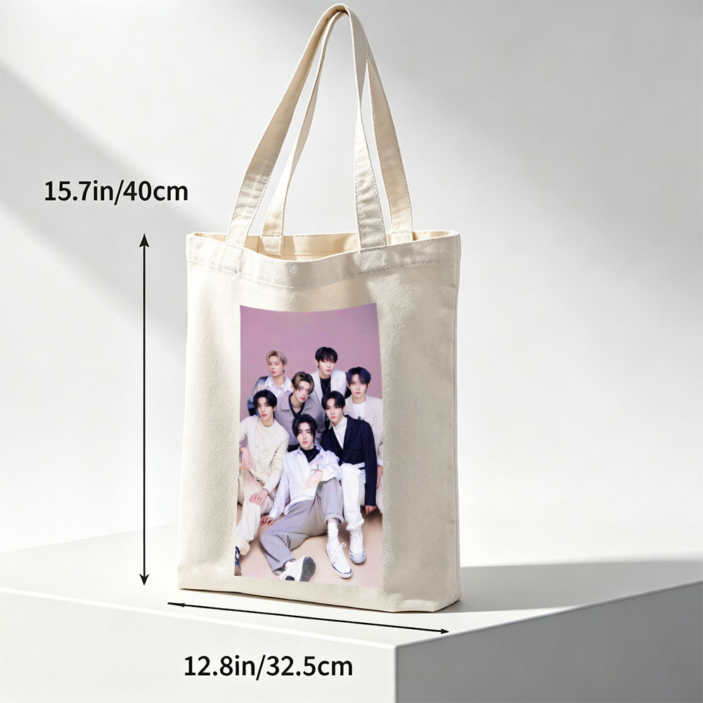 ENHYPEN Group Photo in Stylish Outfits Against Soft Pink Background - Canvas tote bags