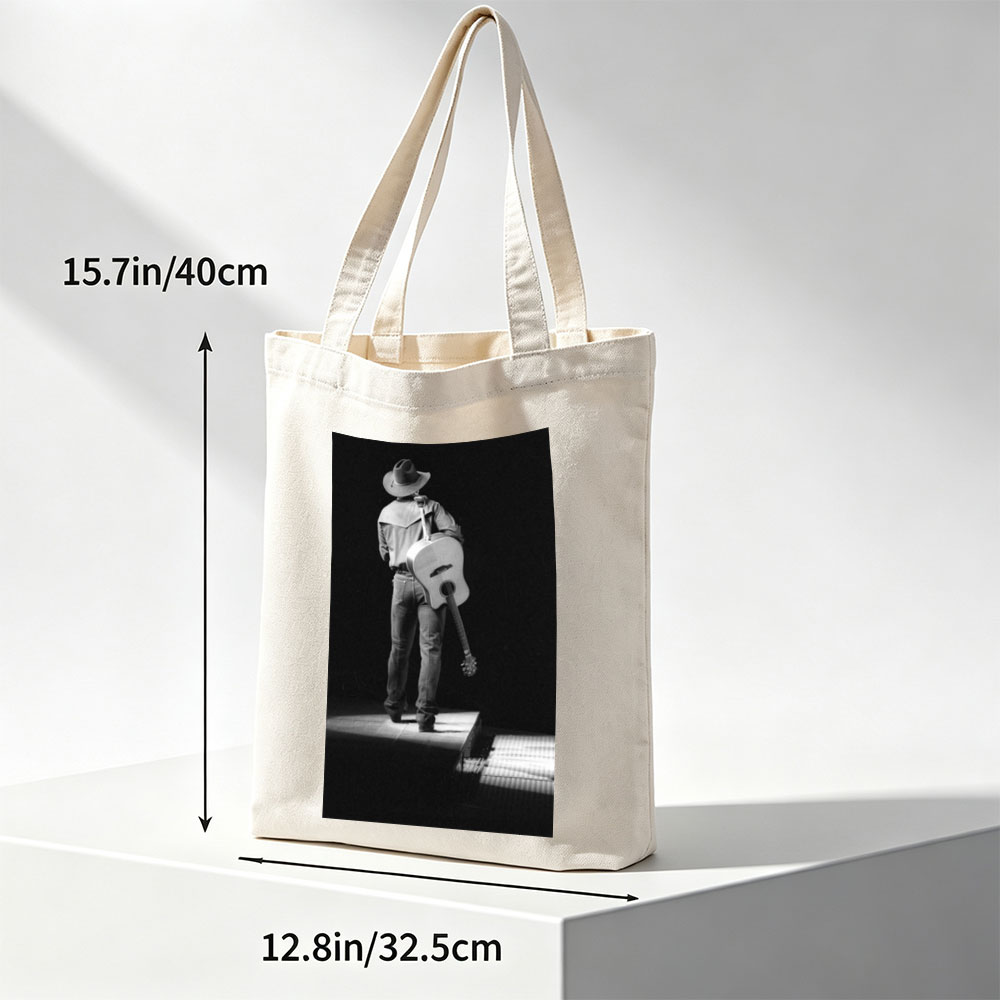 Willie Nelson on Stage with Acoustic Guitar in Black and White Portrait - Canvas tote bags