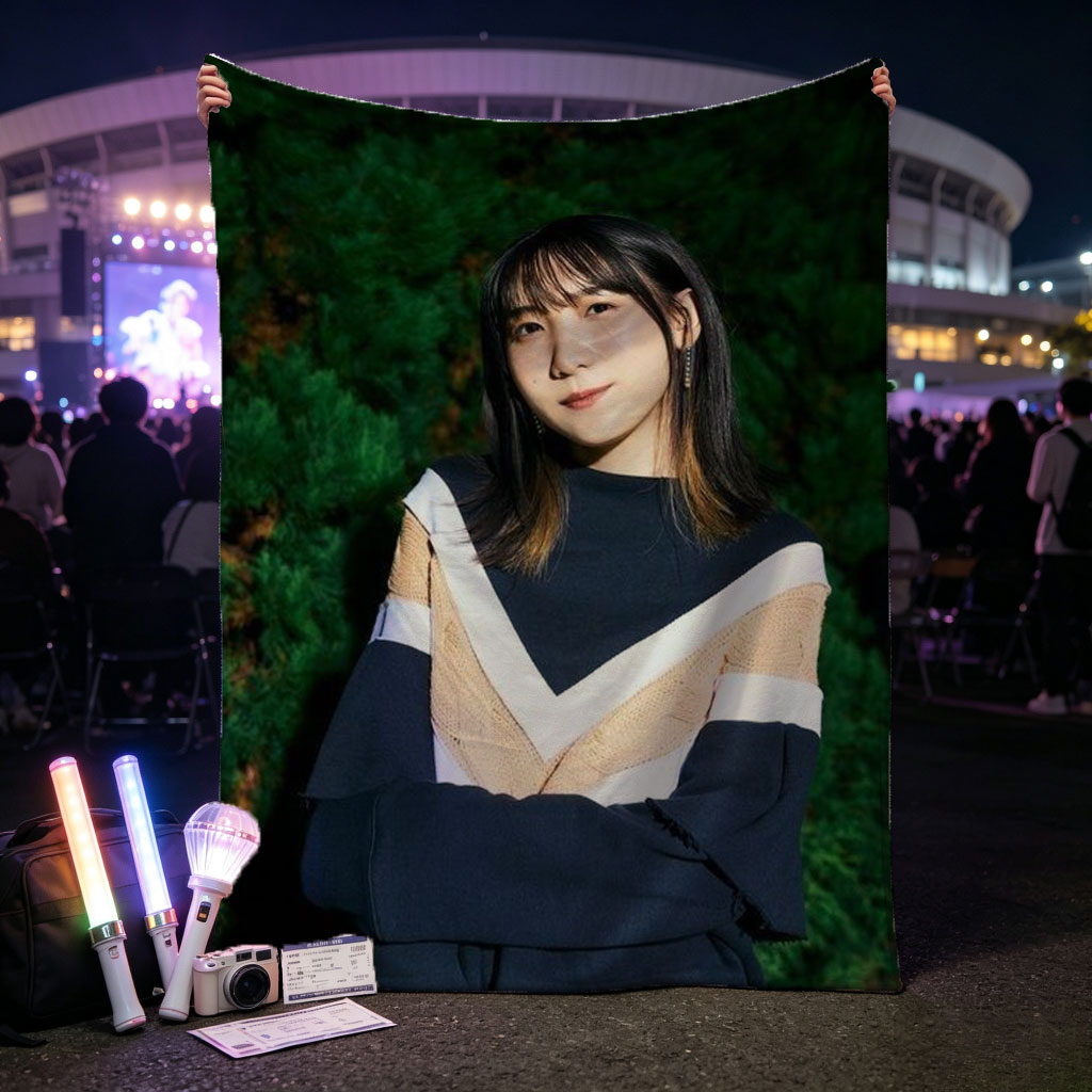 Yui Aragaki in a Stylish Outdoor Portrait with Arms Crossed Against Greenery Background - Blankets