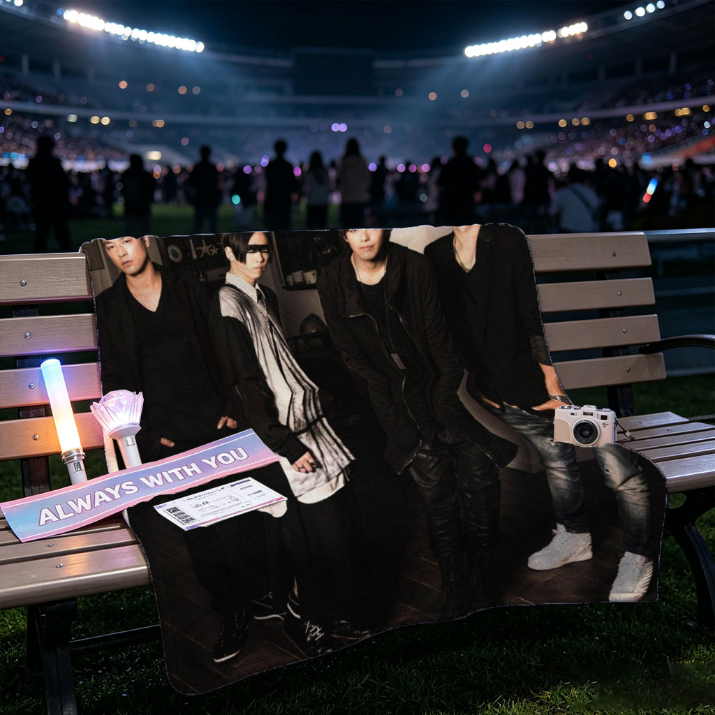 SPYAIR Band Members Standing in a Dimly Lit Room with Bold Number 4 and Band Name Overlay - Blankets