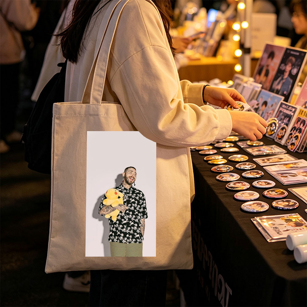 Post Malone Holding a Pikachu Plush Toy in a Patterned Shirt and Checkered Pants - Canvas tote bags