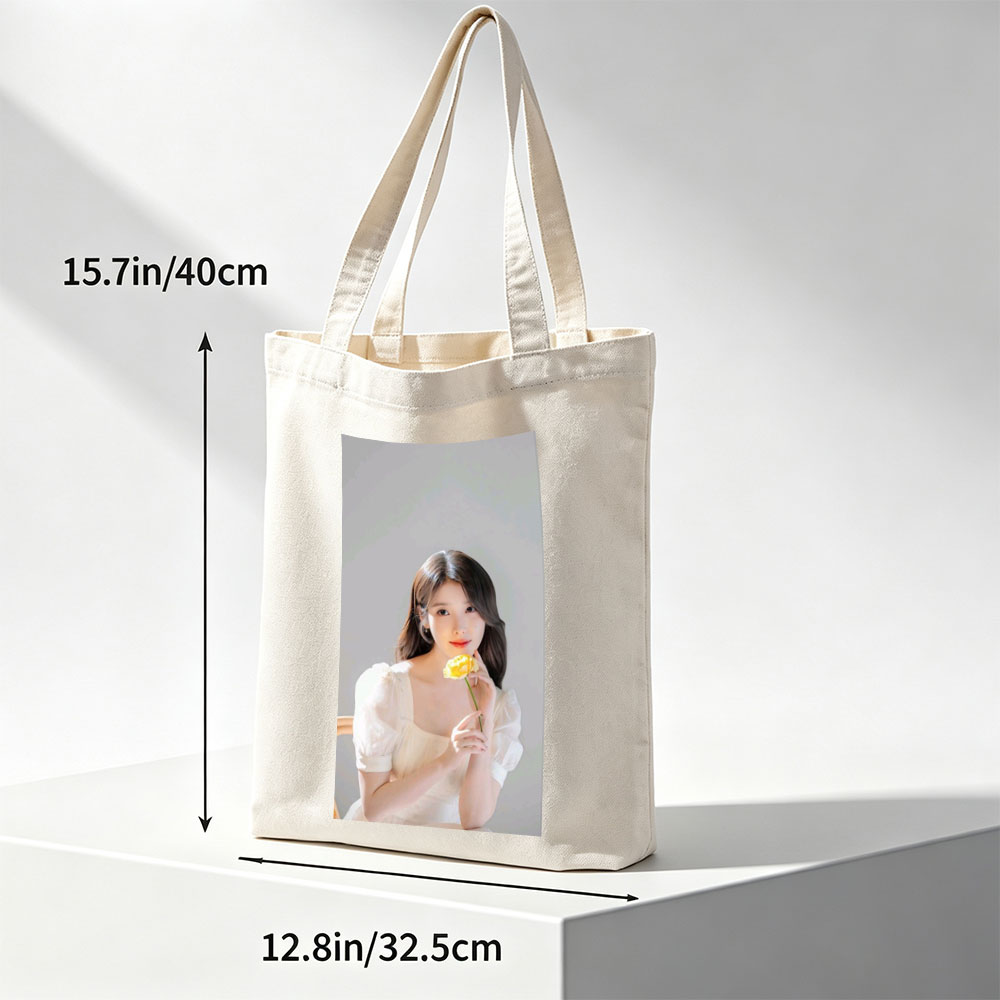 IU Holding a Yellow Rose in a Soft White Dress - Canvas tote bags