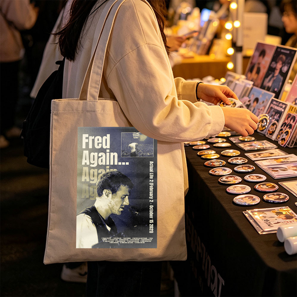 Fred Again... Live Performance Poster Featuring Artist on Stage with Microphone and Concert Crowd in Background - Canvas tote bags