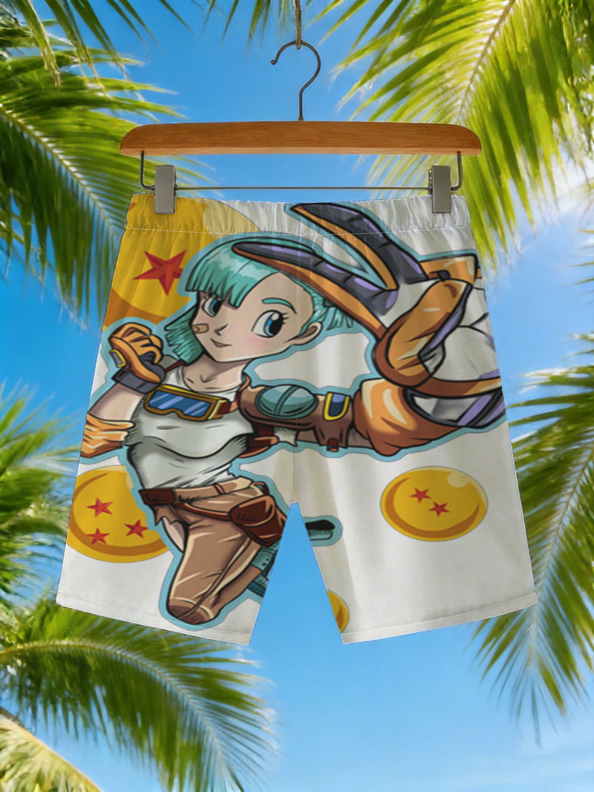 Bulma from Dragon Ball, holding a scouter, surrounded by Dragon Balls -  Beach shorts