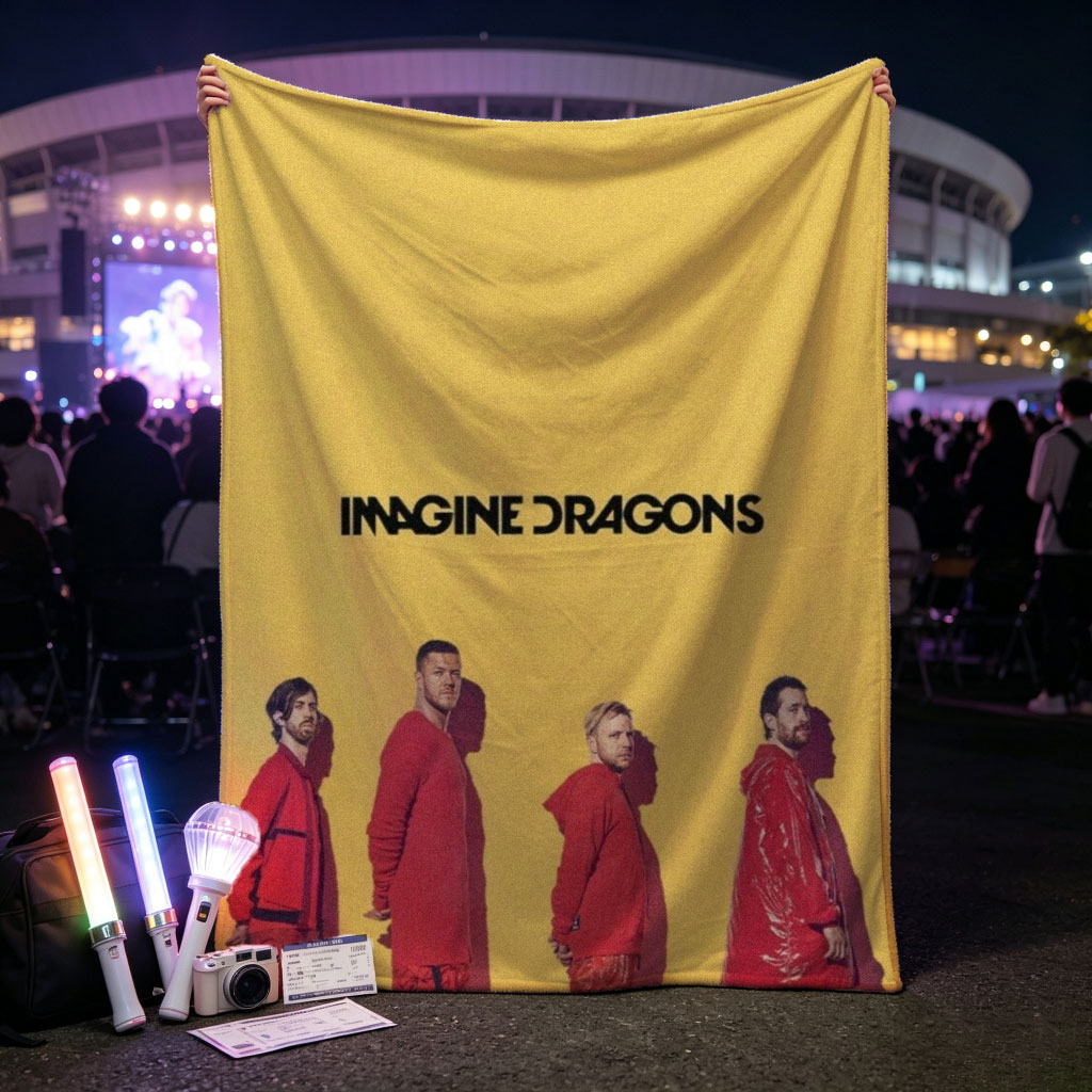 Imagine Dragons Standing in Red Outfits Against a Yellow Background - Blankets