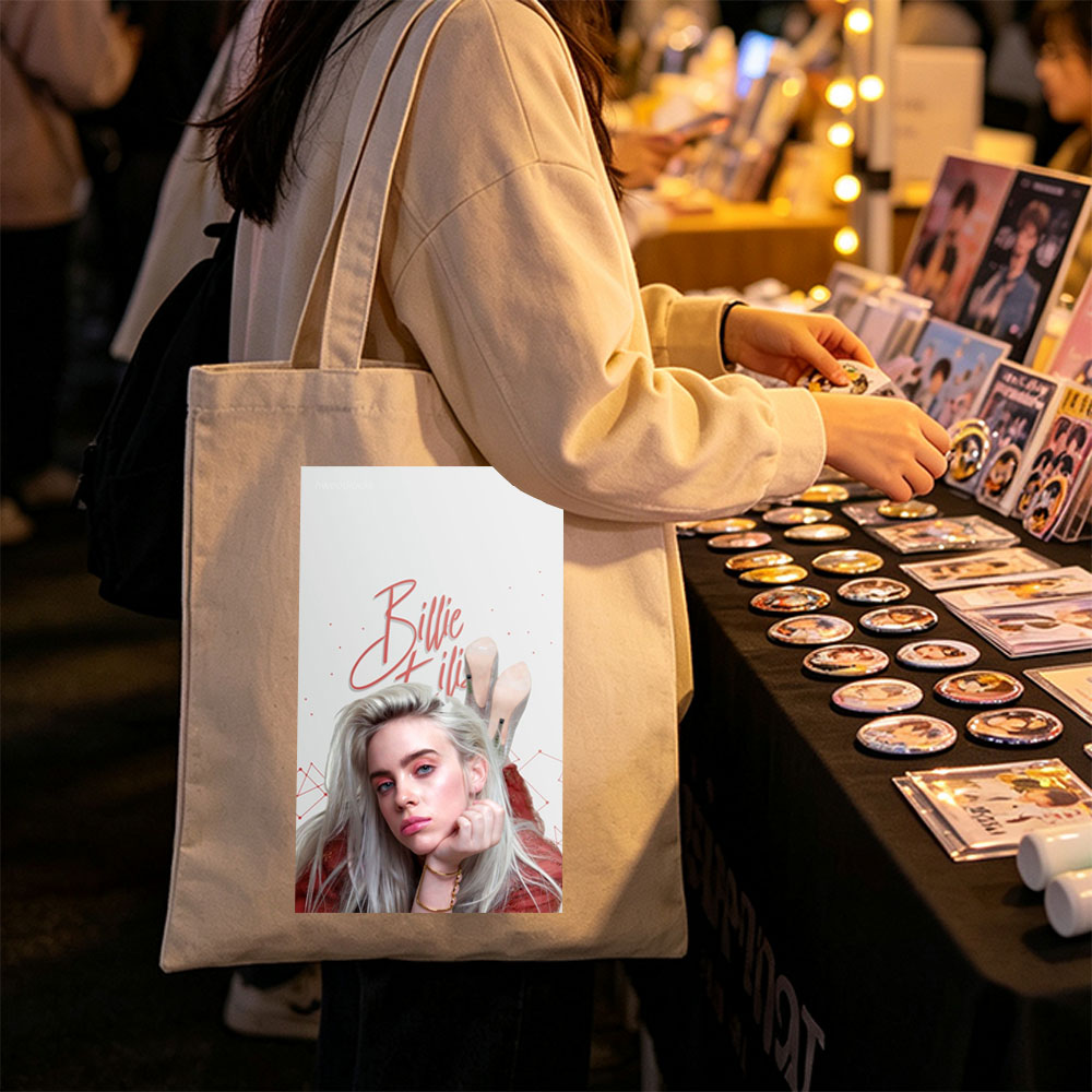 Billie Eilish - Close-Up Portrait with Blonde Hair and Red Outfit - Canvas tote bags
