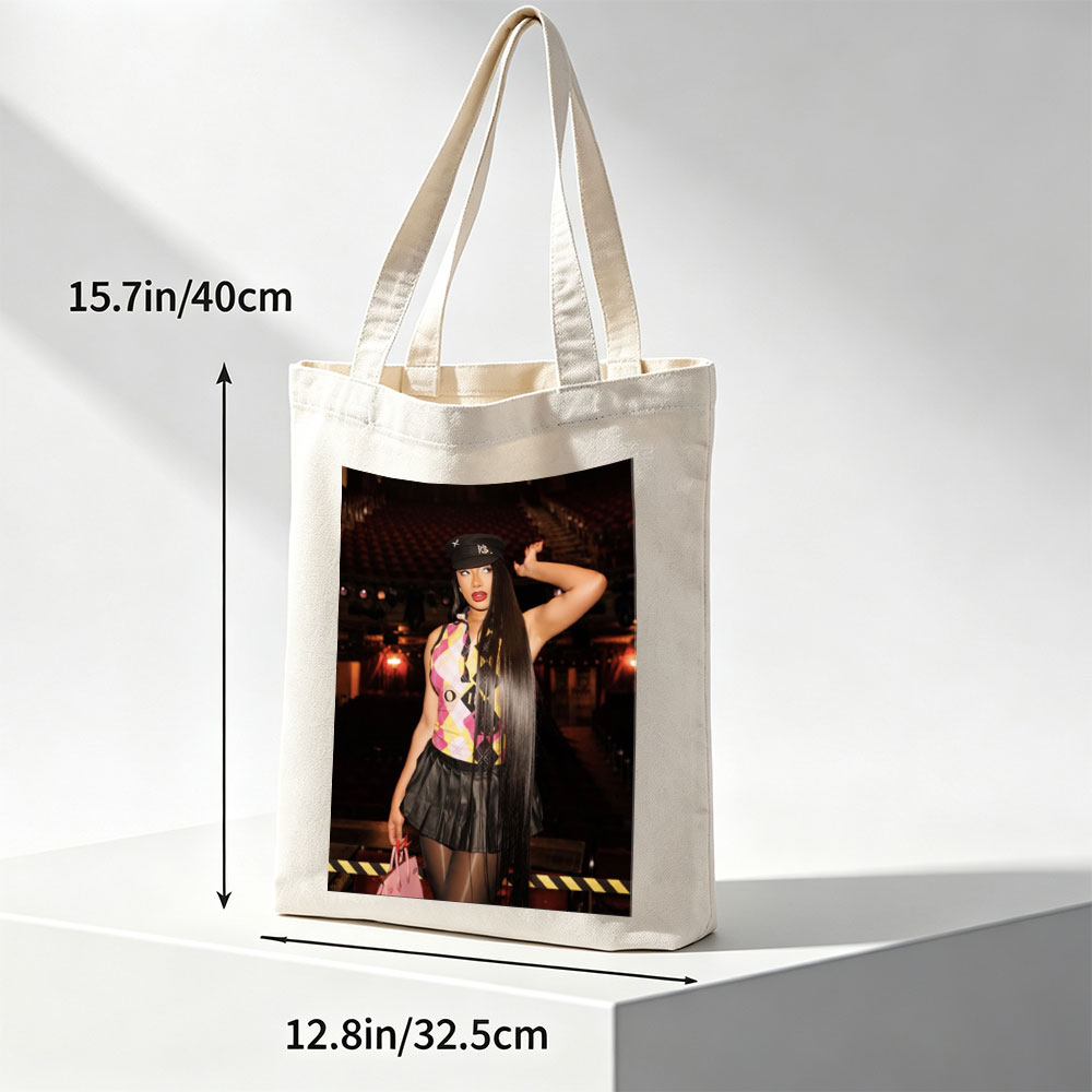 Cardi B in a Bold Outfit at a Concert Venue with Vibrant Lighting and Stage Setup - Canvas tote bags