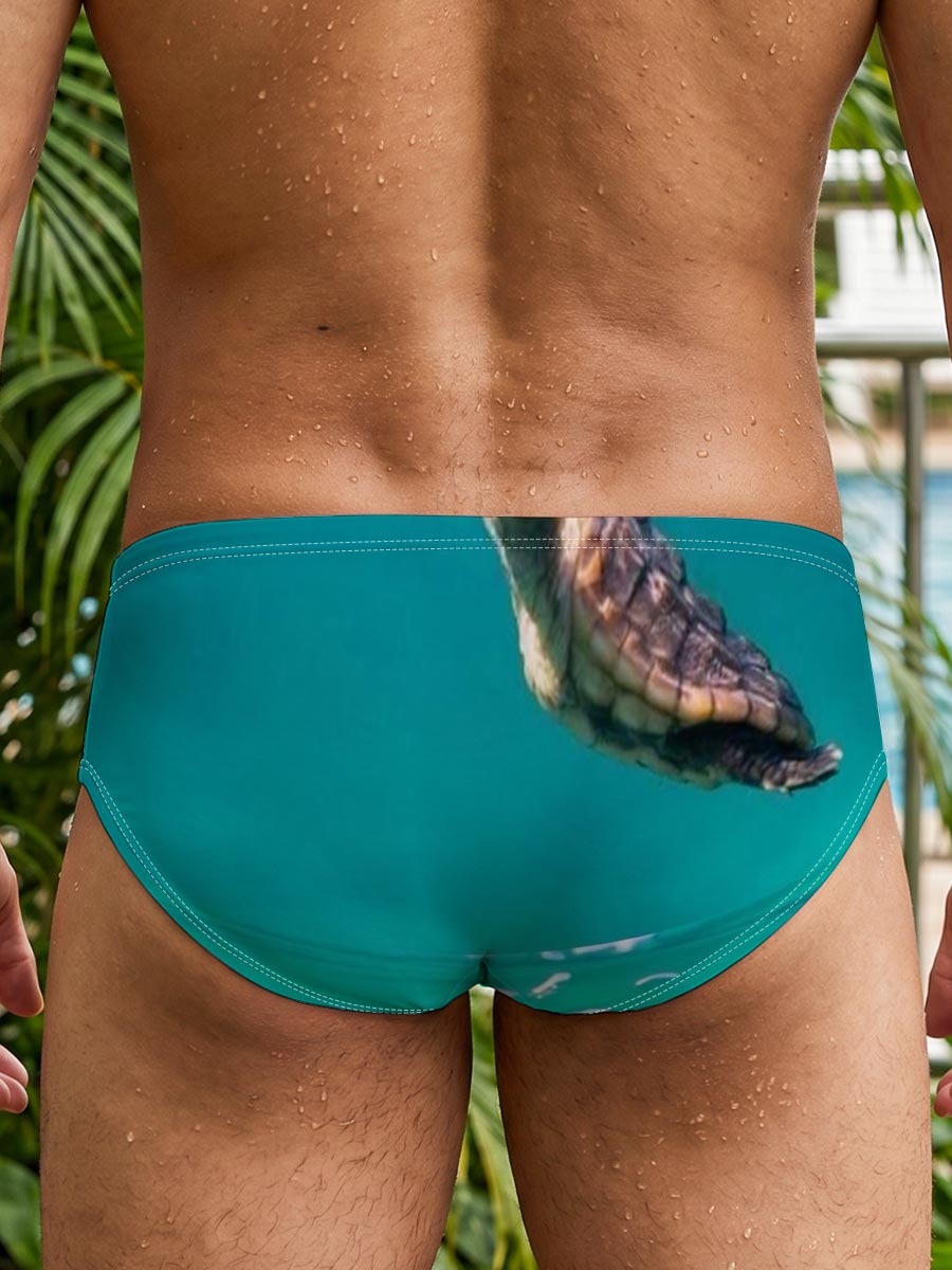 Sea turtles swimming above and below water surface -  Men's swim trunks