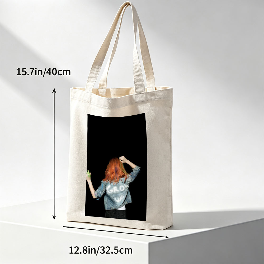 BTS Jungkook in a vibrant performance scene with colorful hair and denim jacket against a black background - Canvas tote bags