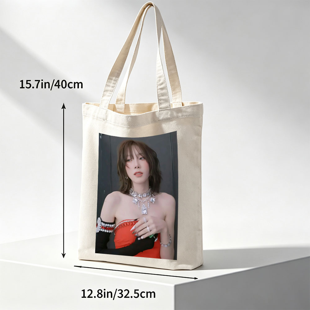 Taeyeon in a glamorous red outfit with sparkling jewelry and bold accessories - Canvas tote bags