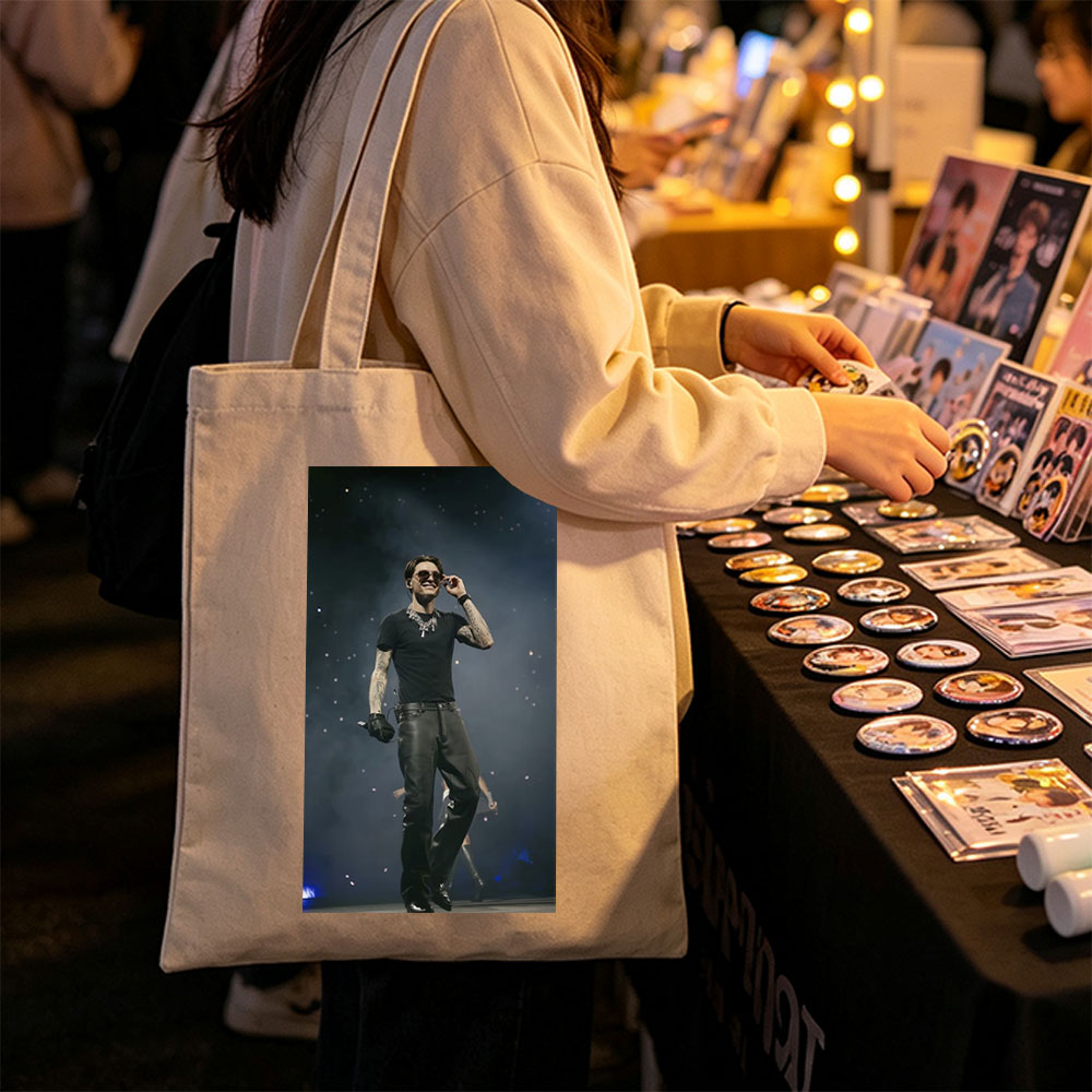 Machine Gun Kelly on Stage Performing in Black Outfit with Tattoos and Sunglasses - Canvas tote bags