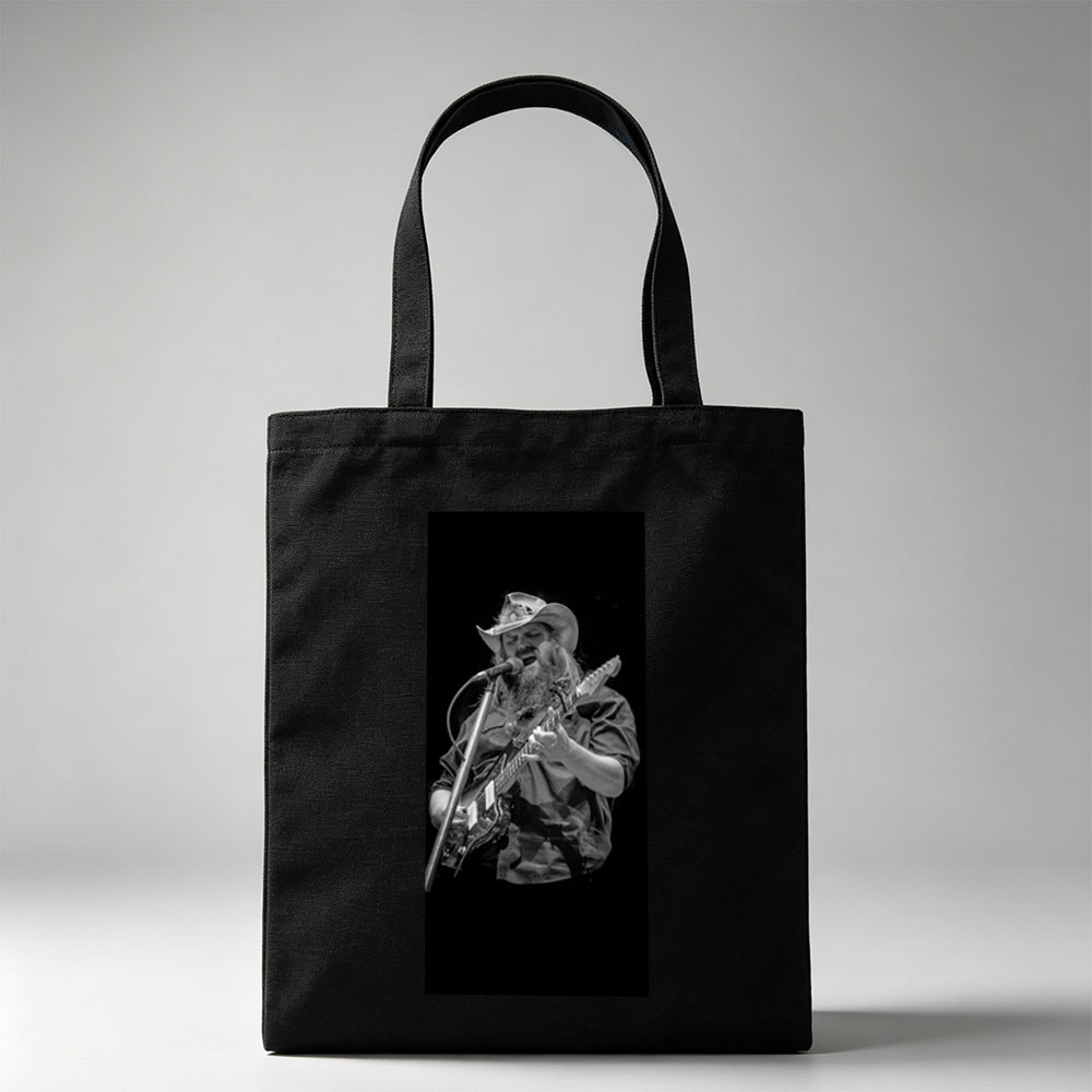 Chris Stapleton Performing Live with Guitar and Microphone on Stage - Canvas tote bags