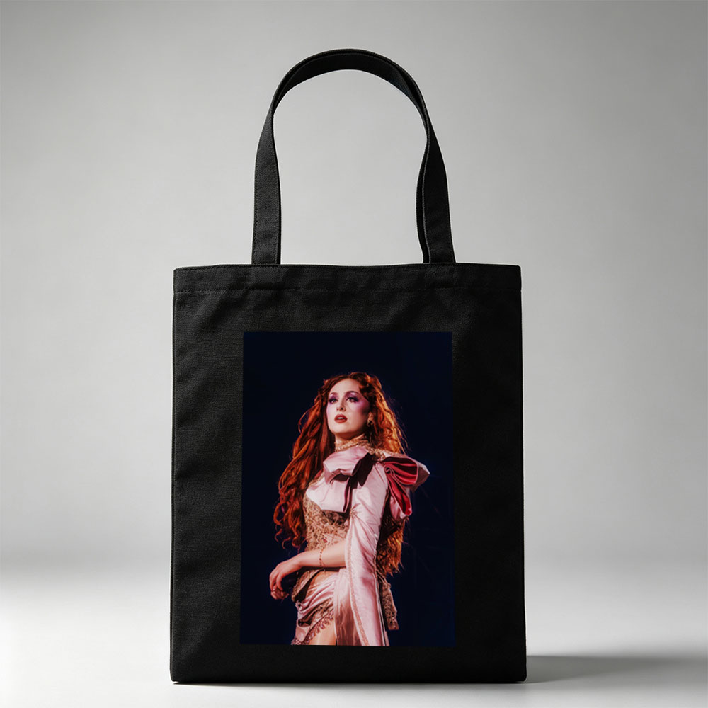 Katy Perry in a Dramatic Performance Scene Wearing a Pink Satin Outfit with Elegant Makeup and Long Red Hair - Canvas tote bags