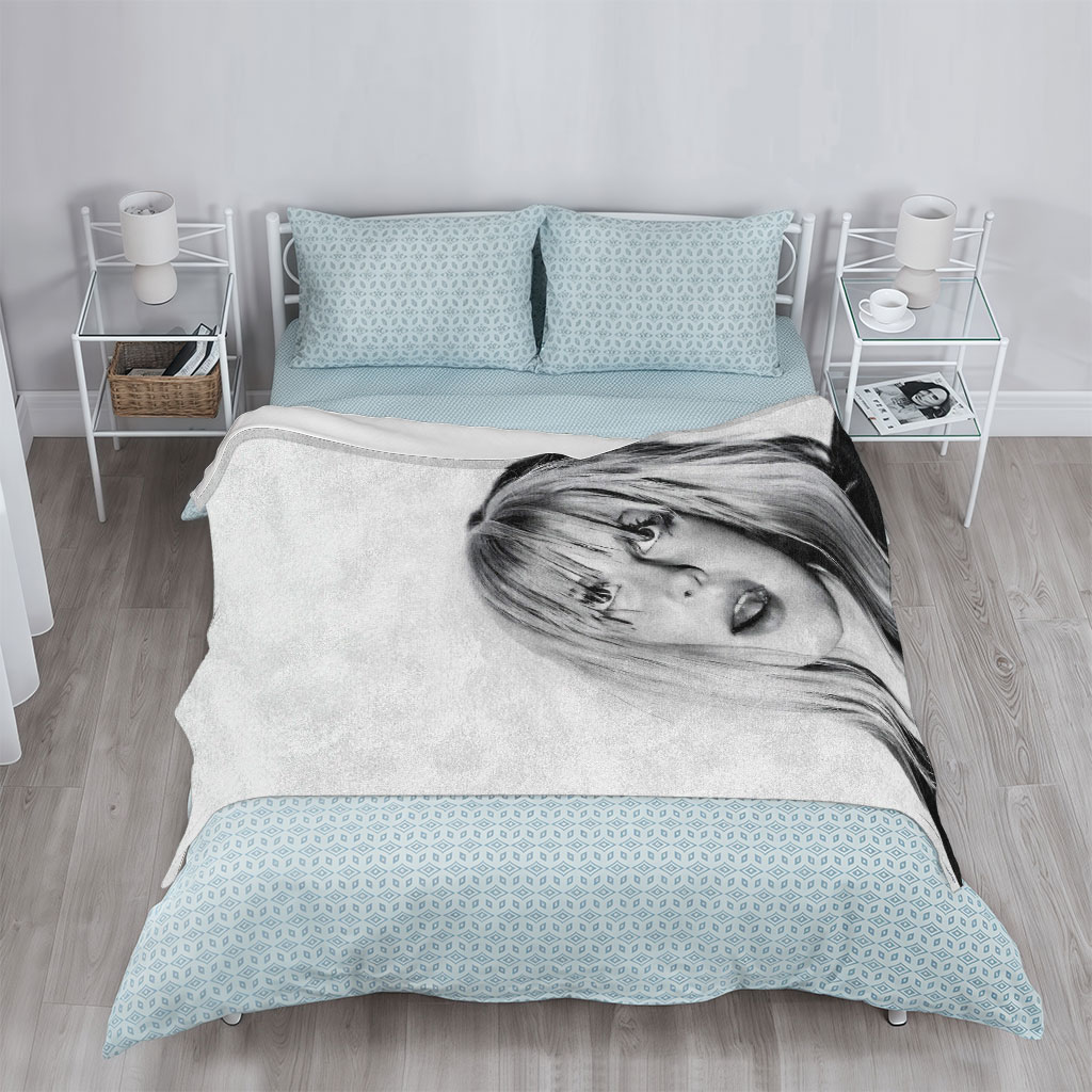 Bebe Rexha in a striking black and white portrait with tousled blonde hair and bold expression - Blankets