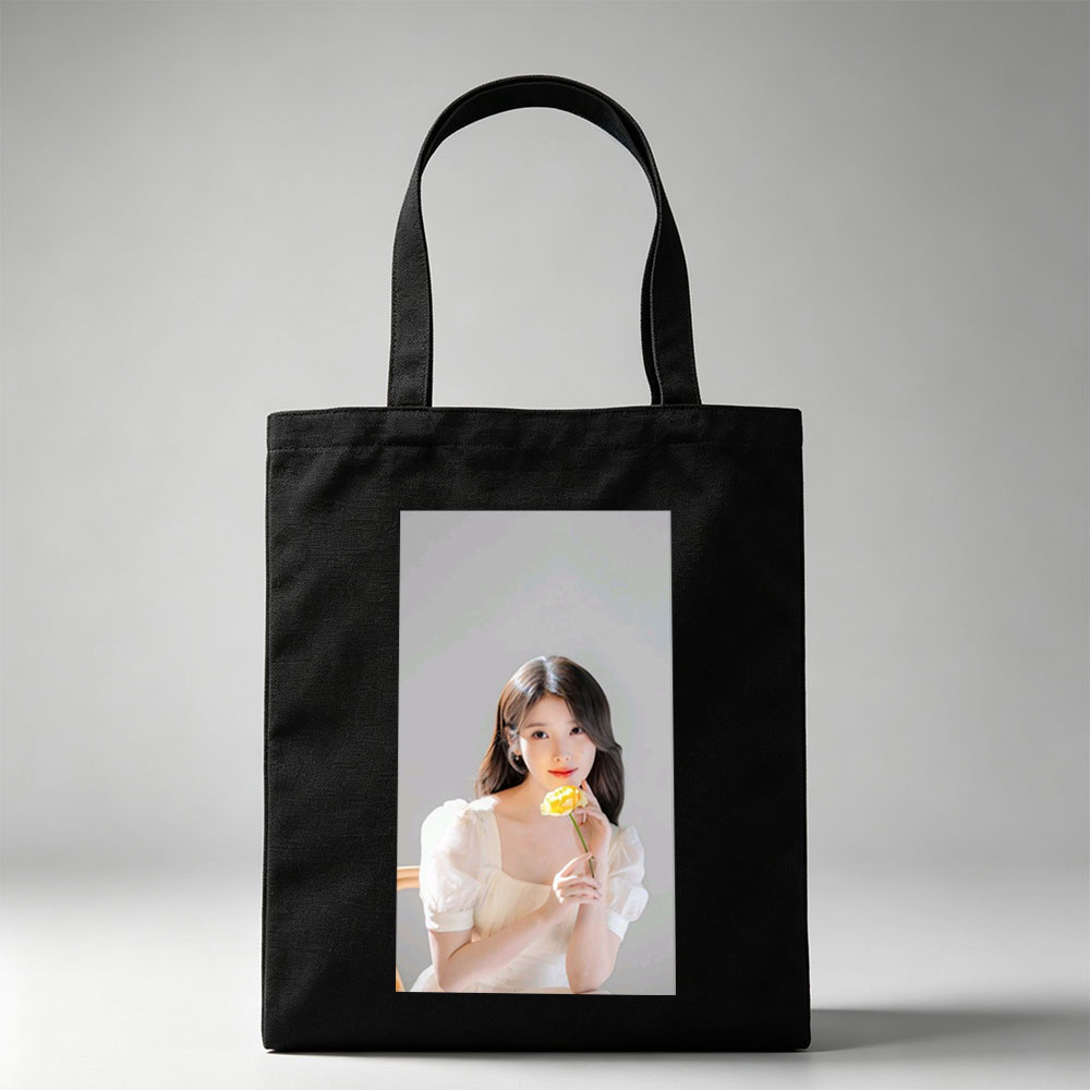 IU Holding a Yellow Rose in a Soft White Dress - Canvas tote bags