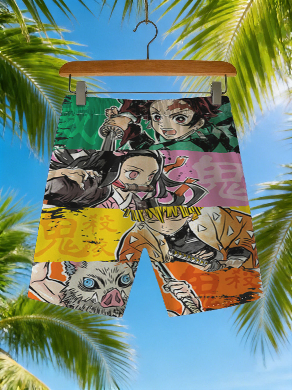 Demon Slayer: Tanjiro, Nezuko, Zenitsu, and Inosuke in Action -  Beach shorts