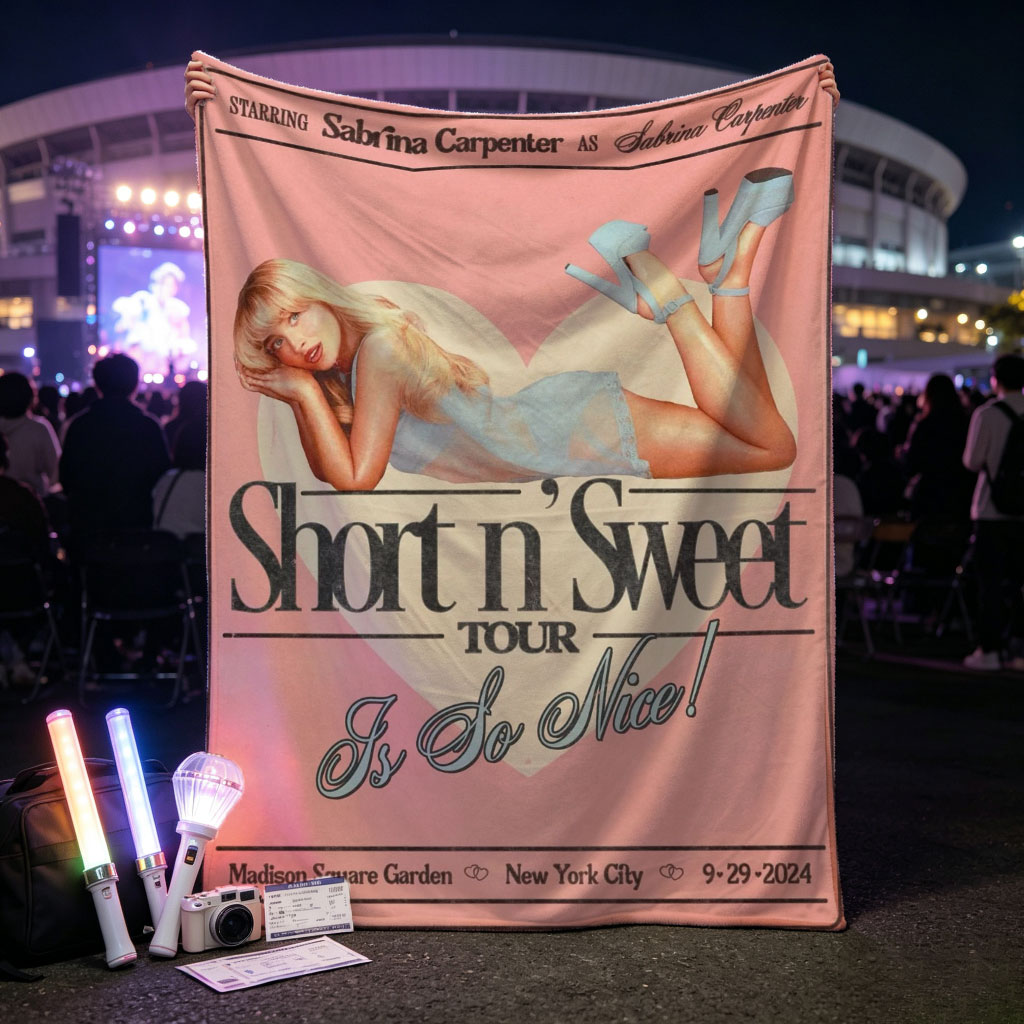 Sabrina Carpenter Short n' Sweet Tour Poster Featuring Her in a Blue Dress and Heels Lying on a Heart Background - Blankets