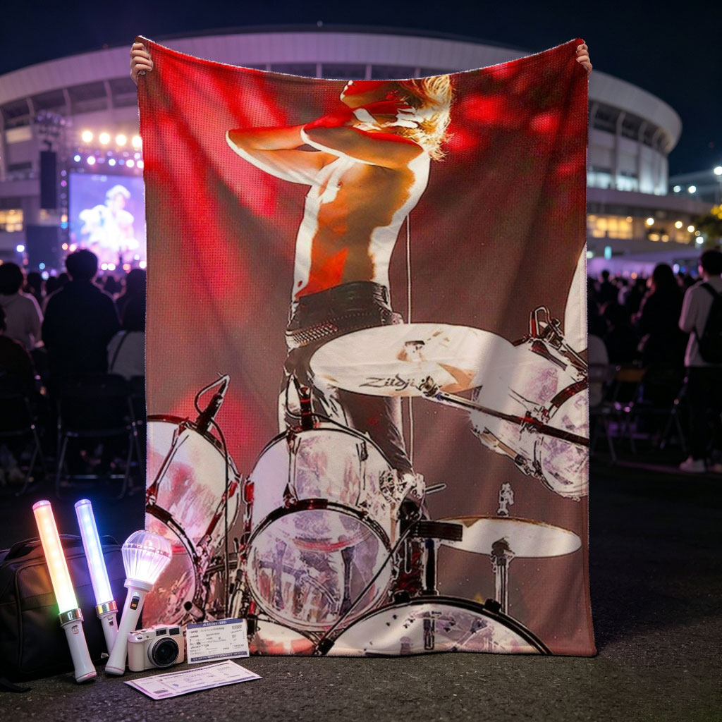 Yoshiki of X Japan on Stage Performing with Drum Set in Intense Red Lighting - Blankets