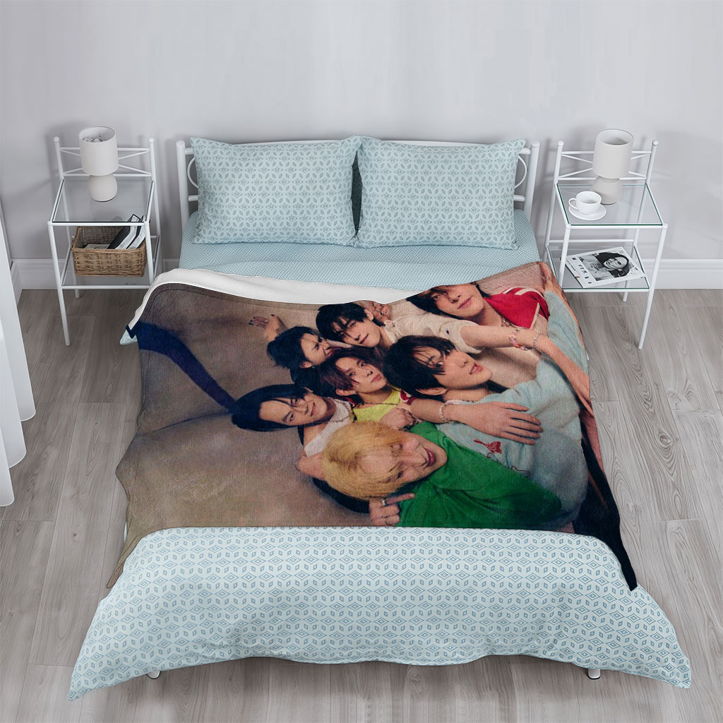 ENHYPEN Group Photo - Close-Up of Members Posing Together in a Cozy Indoor Setting - Blankets