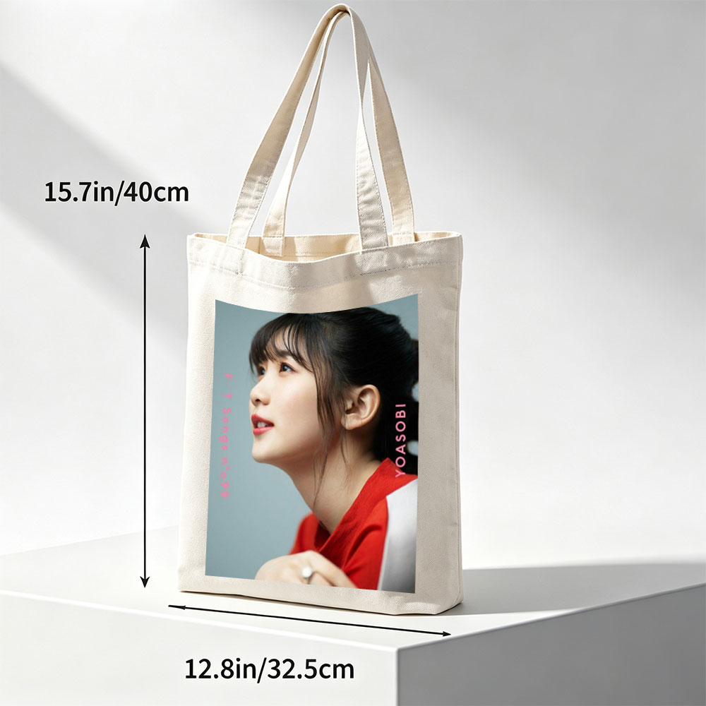 YOASOBI in a Serene Moment with Soft Lighting and Red Outfit - Canvas tote bags