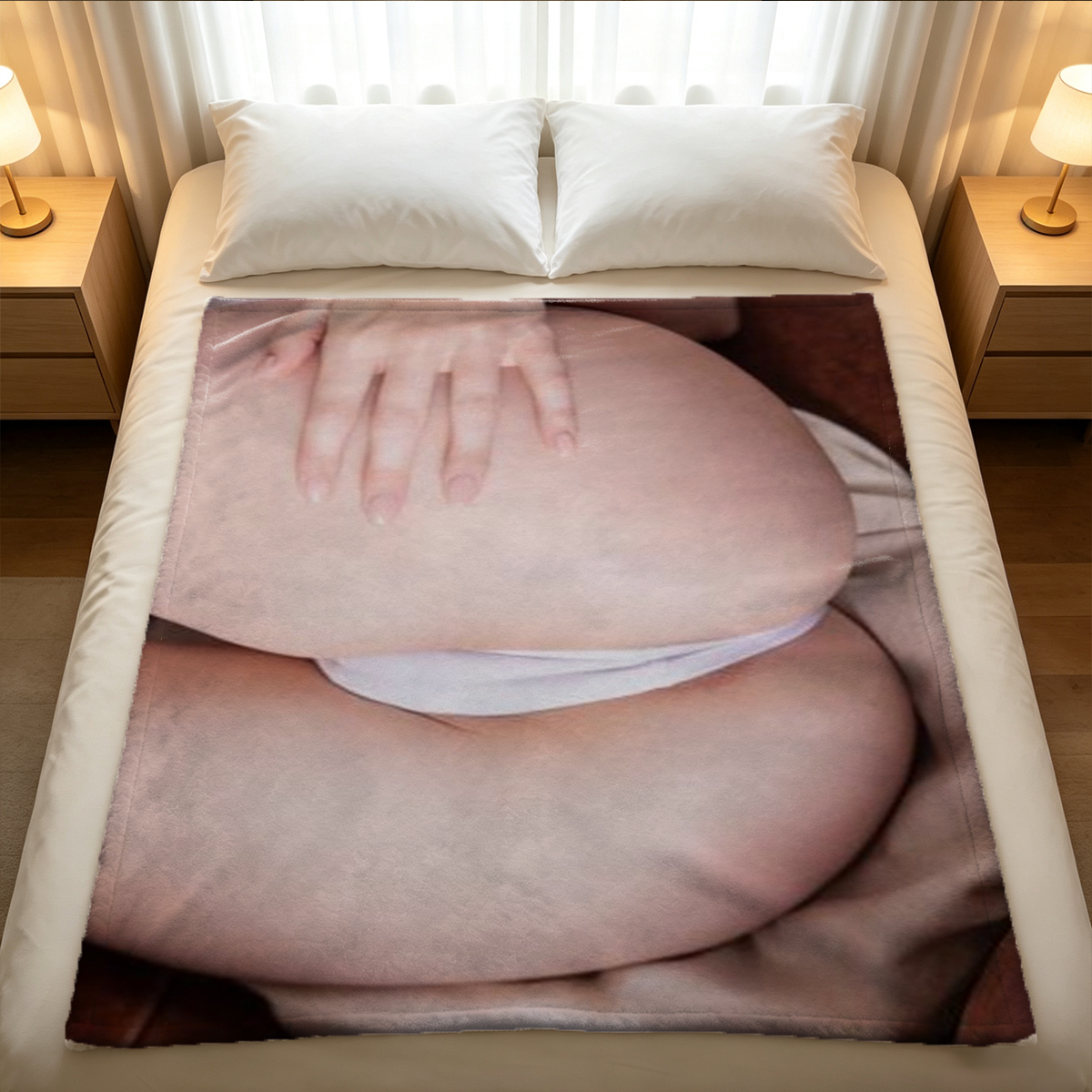 A woman in lavender lingerie and sheer thigh-high stockings posing seductively on a couch. - Blanket