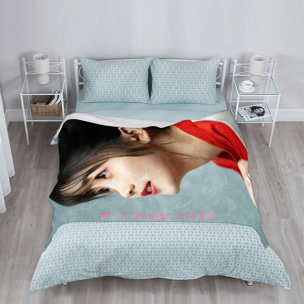 YOASOBI in a Serene Moment with Soft Lighting and Red Outfit - Blankets