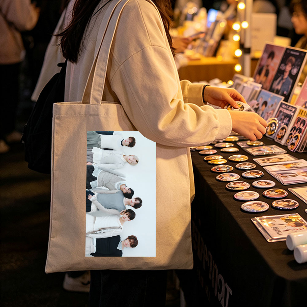 TOMORROW X TOGETHER Members Lying on White Background in Coordinated Outfits - Canvas tote bags