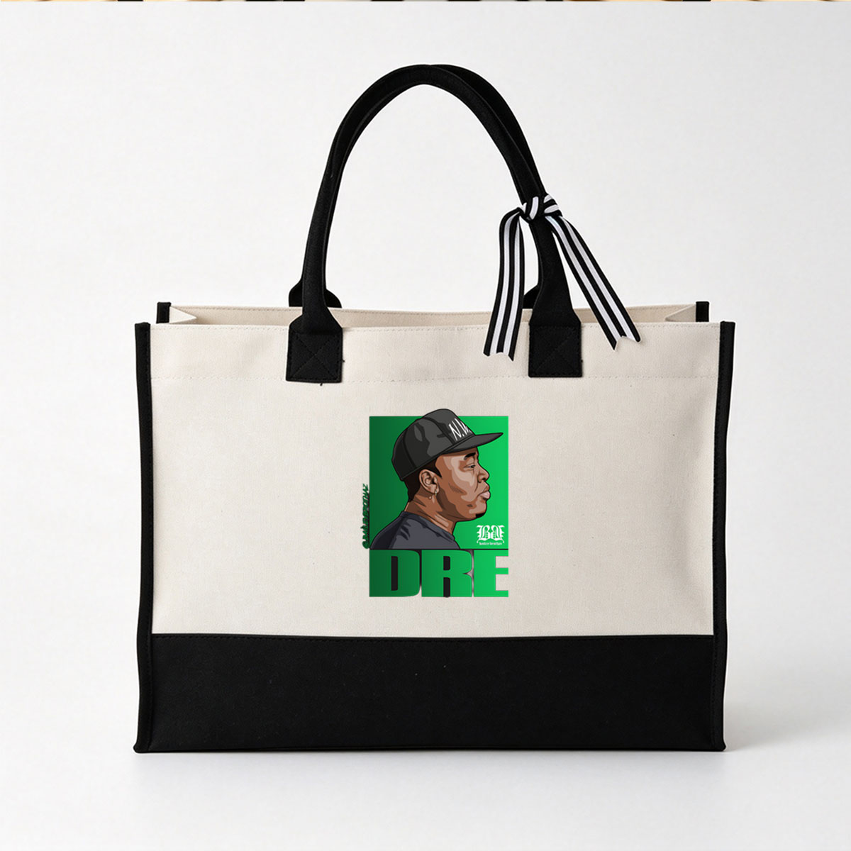 Dre, wearing a black cap with 