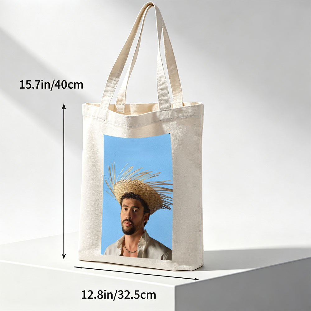 Bad Bunny Wearing a Straw Hat with Spiky Design Against a Blue Background - Canvas tote bags