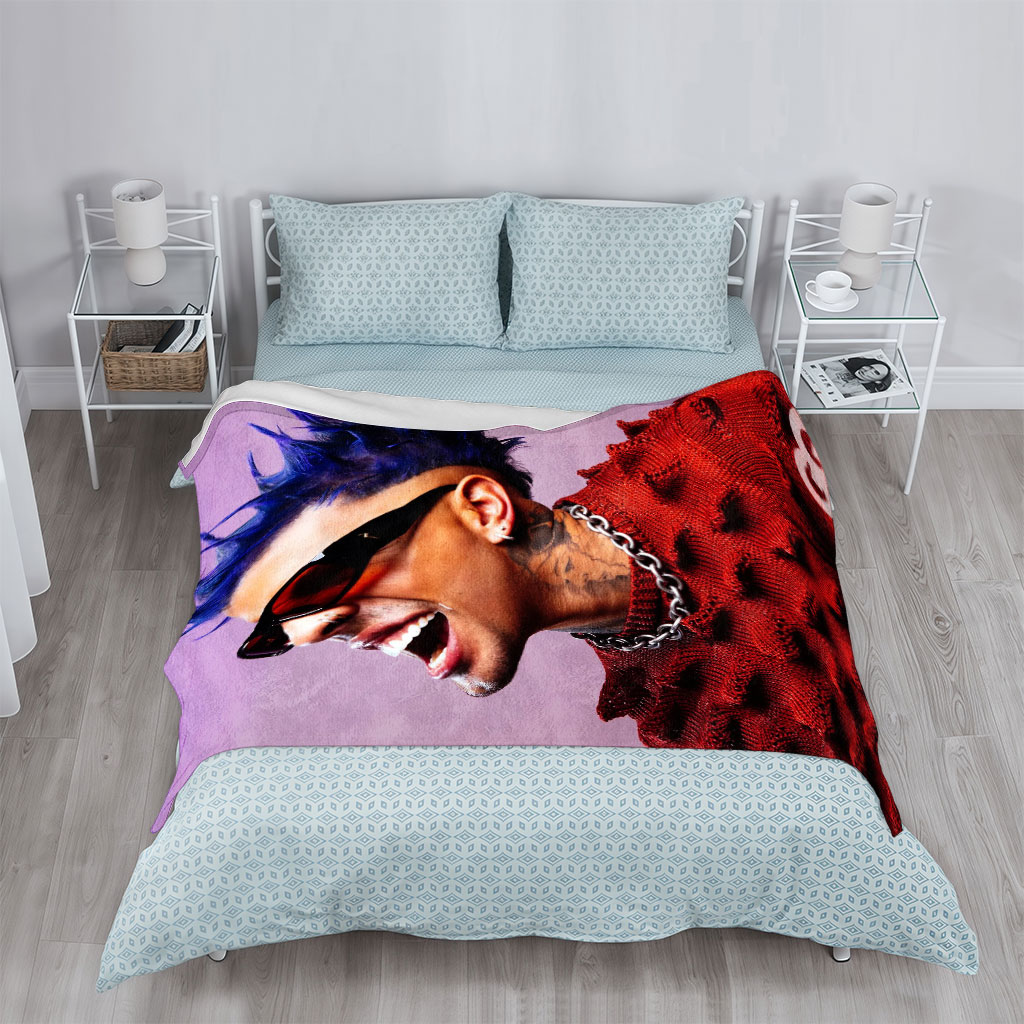 Daddy Yankee in a Bold Red Sweater with Spiky Blue Hair and Sunglasses, Laughing Loudly Against a Purple Background - Blankets
