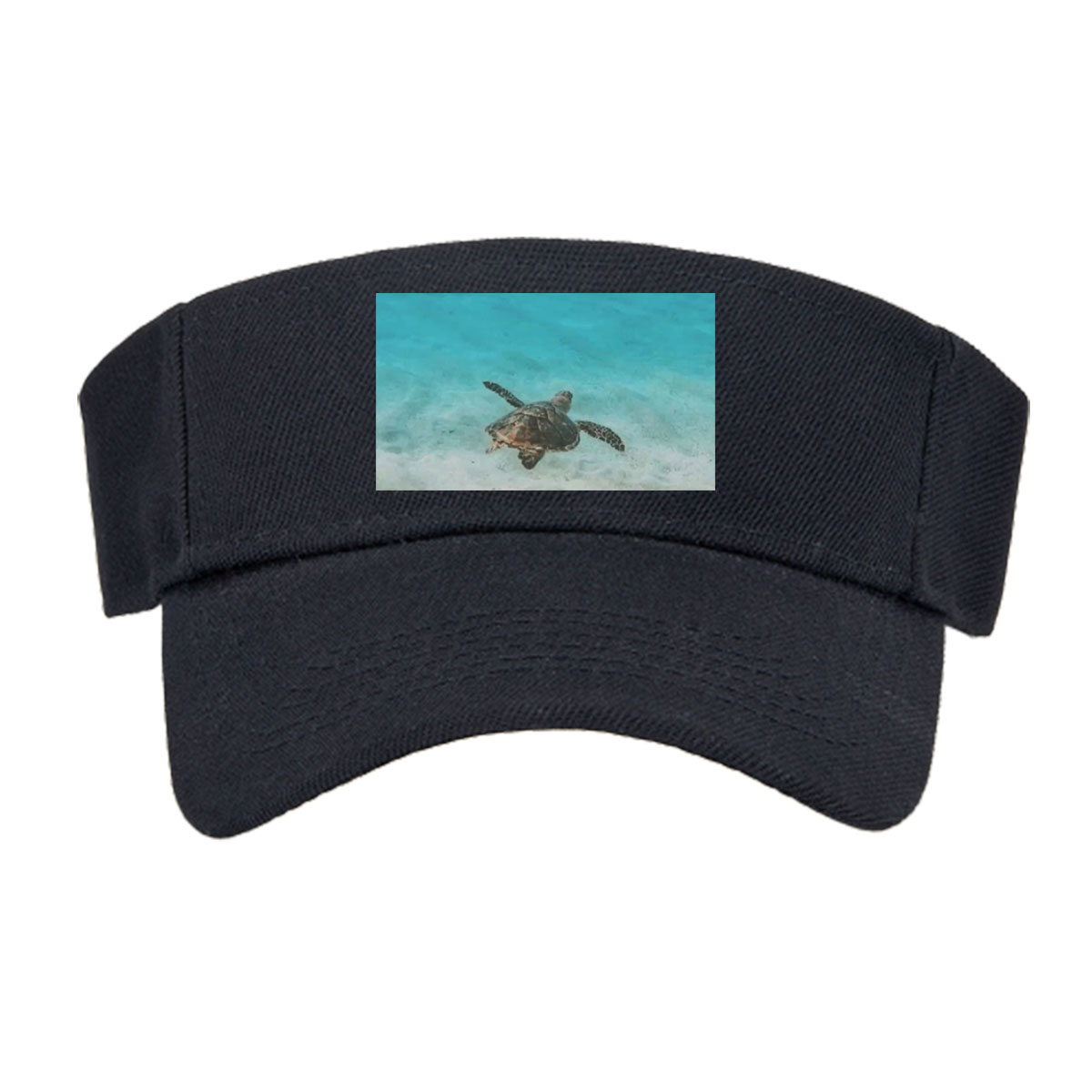 Sea turtle swimming in clear blue water over sandy ocean floor -  Visor cap