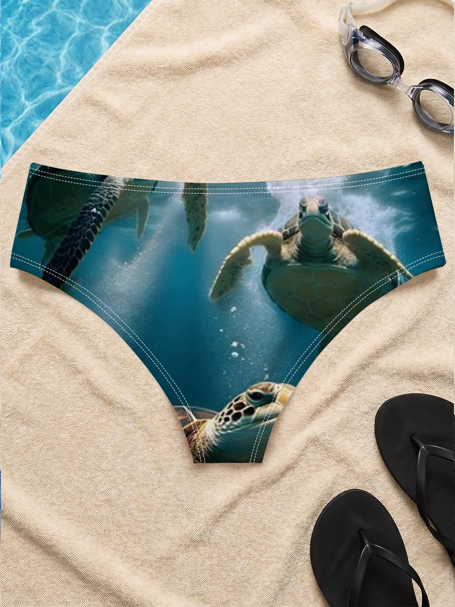Three sea turtles swimming gracefully underwater in clear blue ocean. -  Men's swim trunks