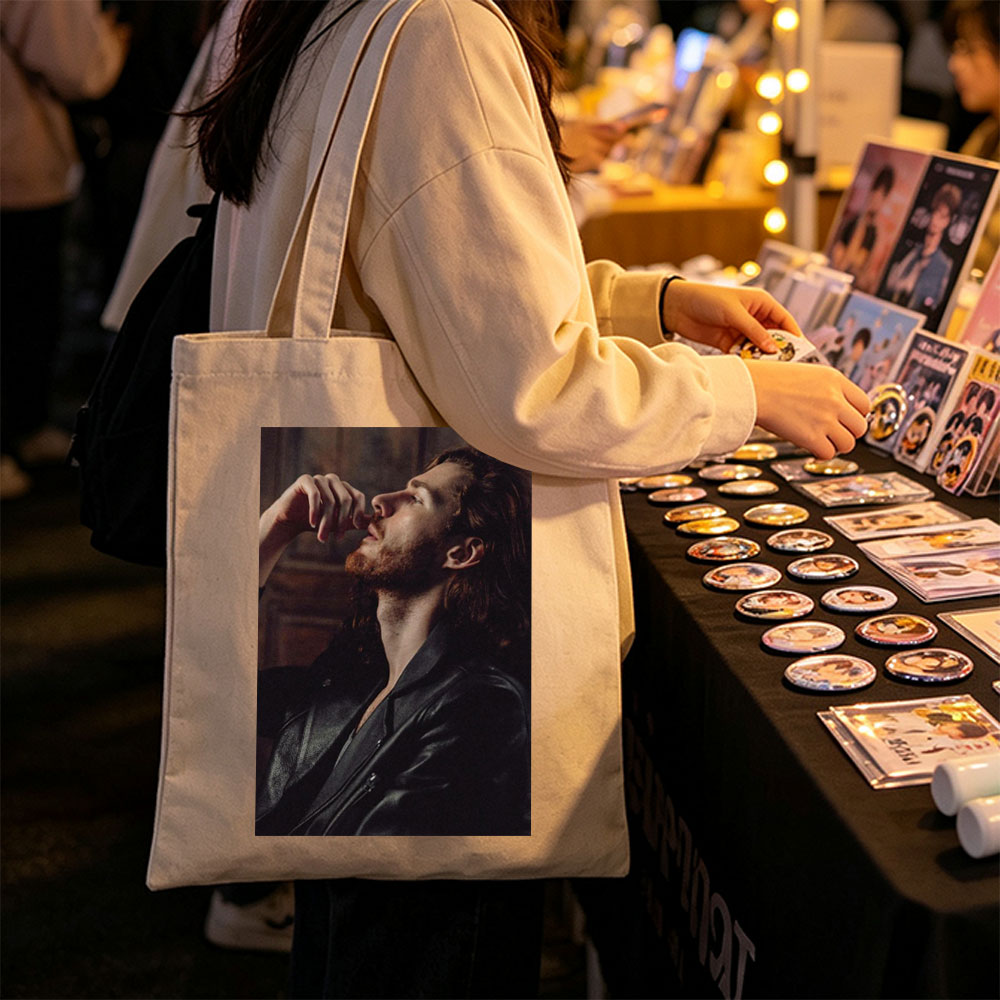 Hozier in a Moody Portrait Wearing a Leather Jacket and Gazing Upward - Canvas tote bags