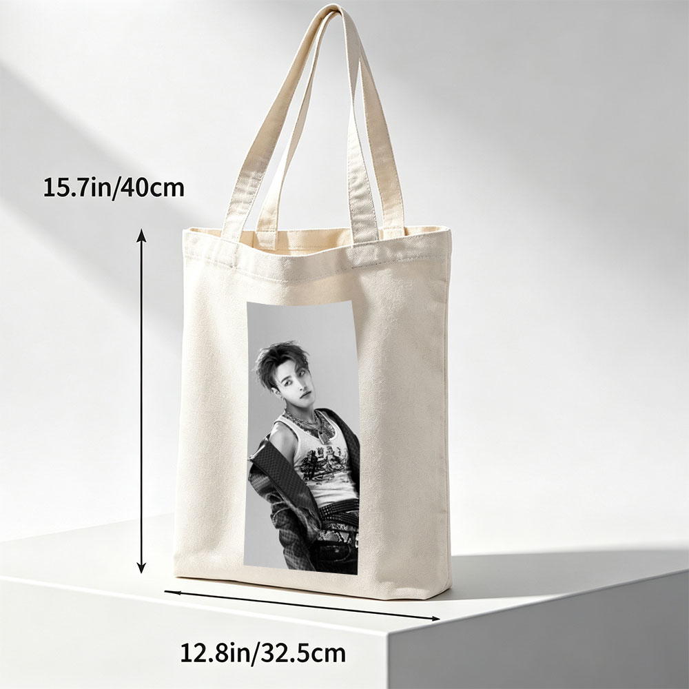 Dino from SEVENTEEN in a stylish black and white portrait wearing a graphic tank top and layered accessories. - Canvas tote bags
