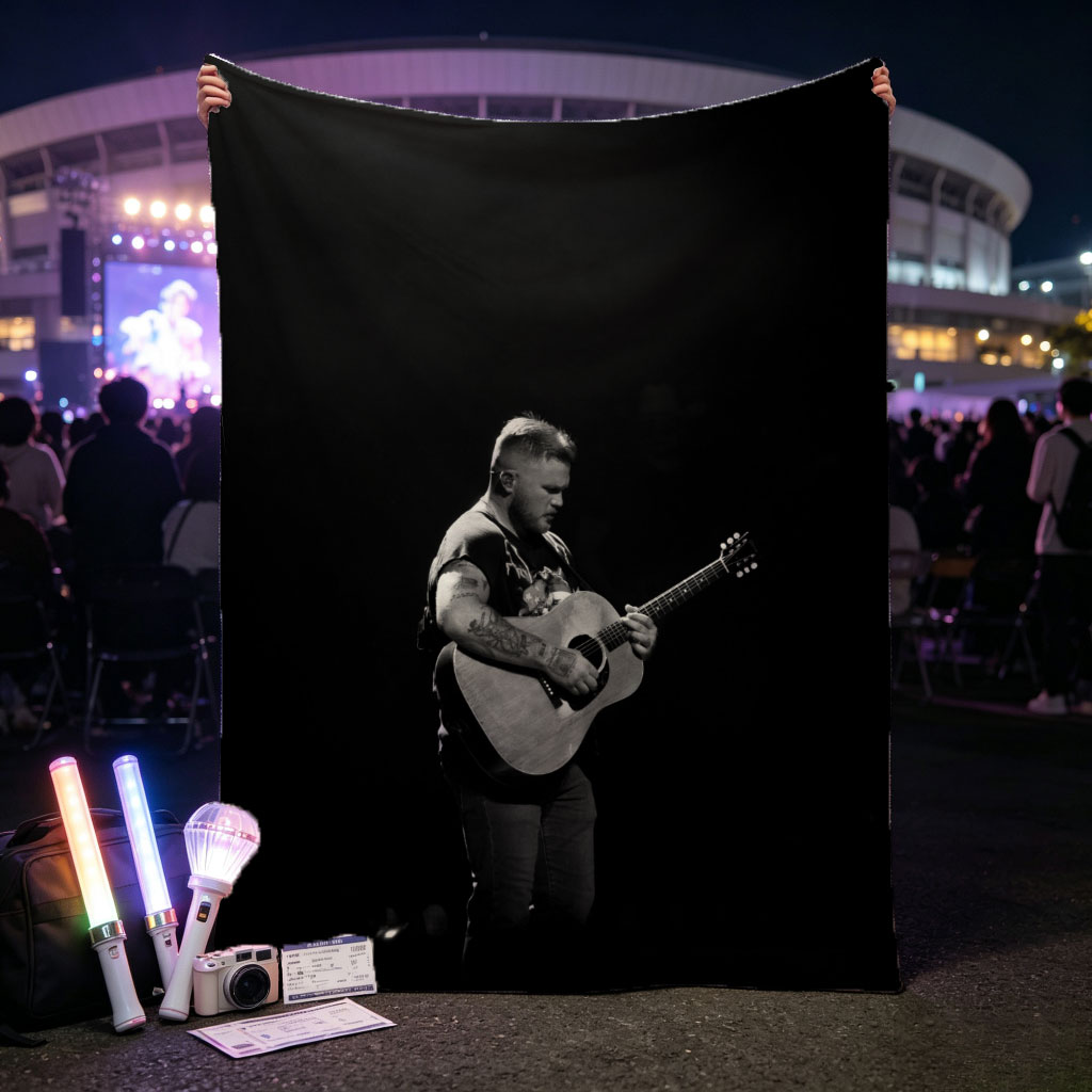 Brantley Gilbert Playing Acoustic Guitar on Stage in Black and White - Blankets
