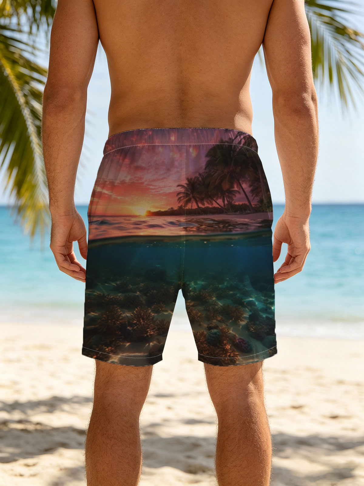 Sunset over tropical beach with underwater coral reef -  Beach shorts