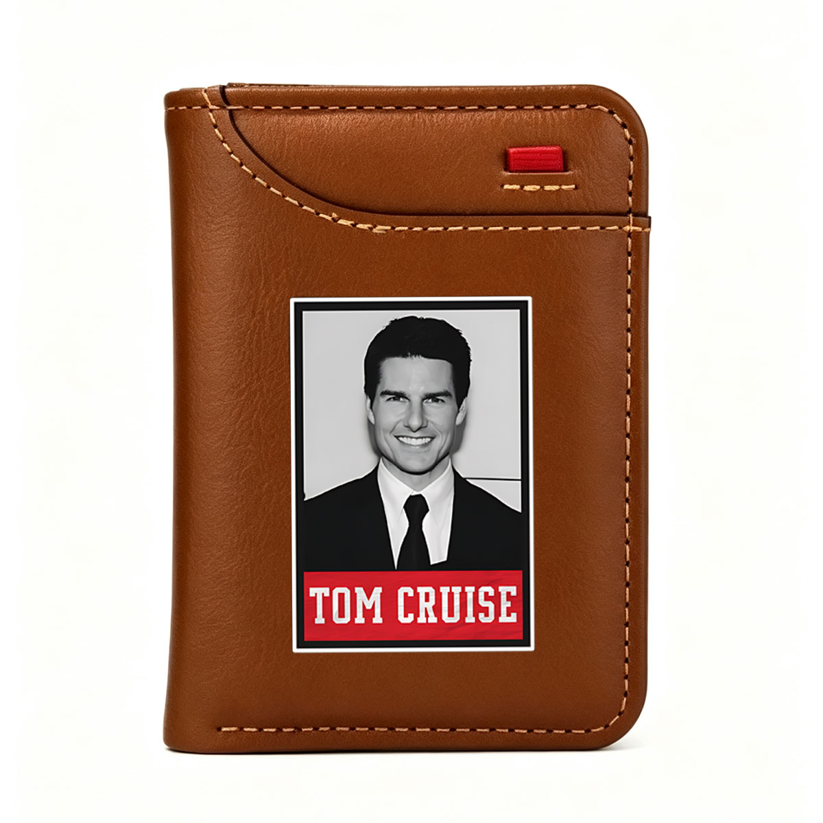 Tom Cruise in a formal suit and tie, smiling confidently. - Vertical Style Wallet
