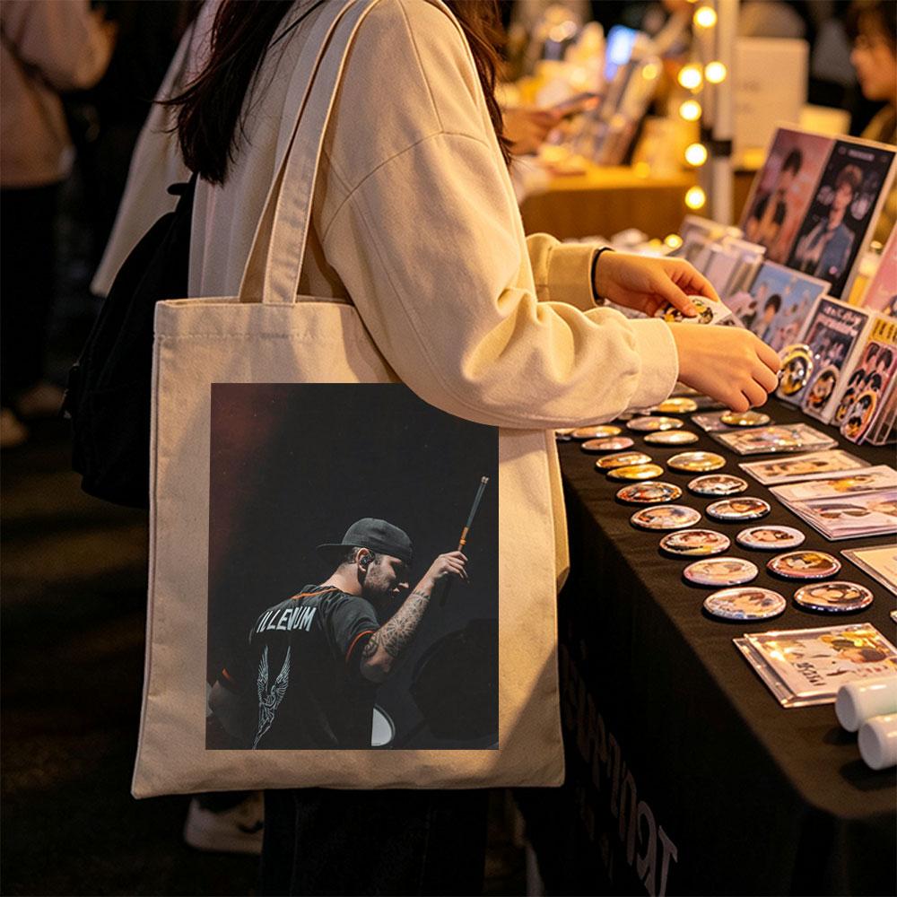 Brent Hinds of Mastodons Performing on Stage with Drumstick in Hand - Canvas tote bags