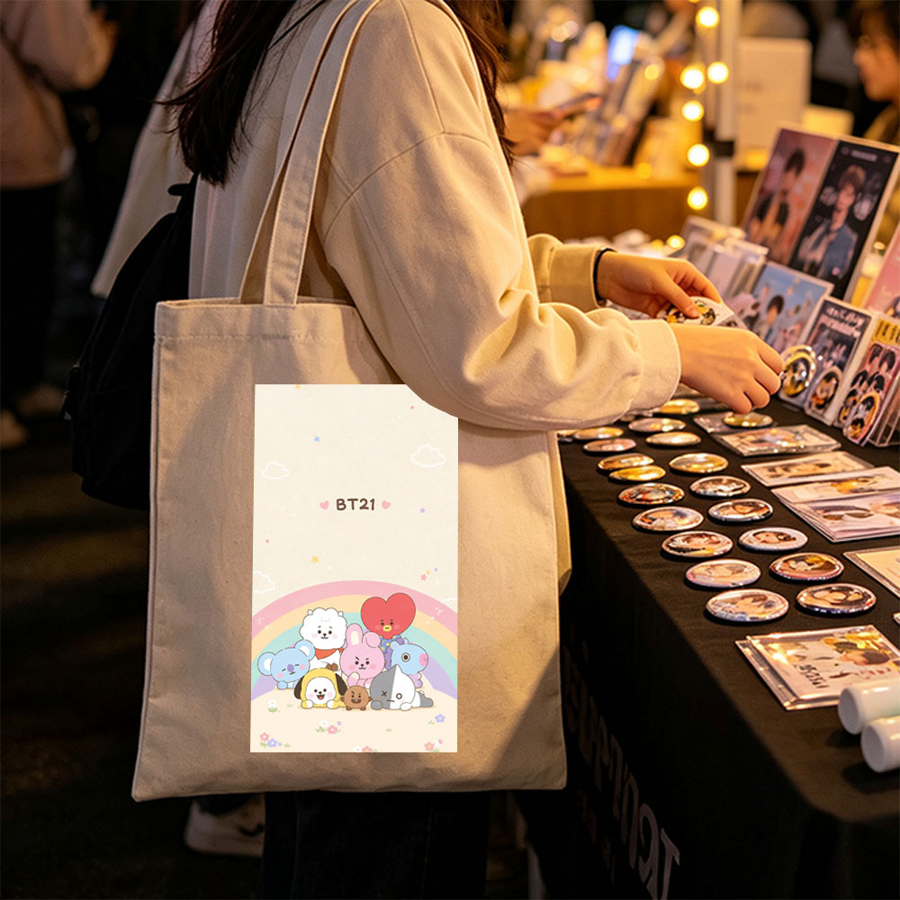 BT21 Characters Gathering Under a Rainbow in a Cute Pastel Scene - Canvas tote bags