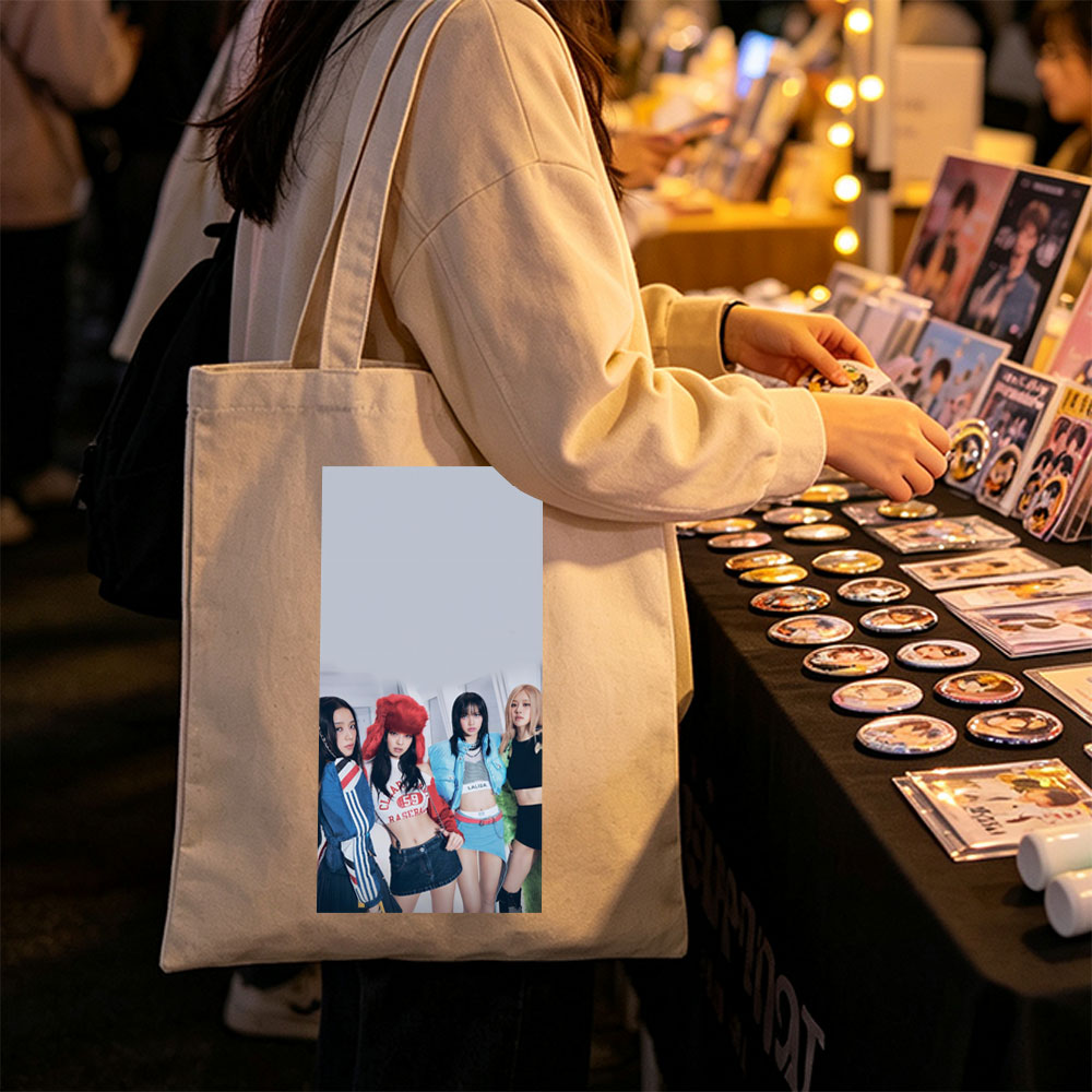 BLACKPINK in a stylish group photo wearing trendy outfits and posing confidently indoors - Canvas tote bags