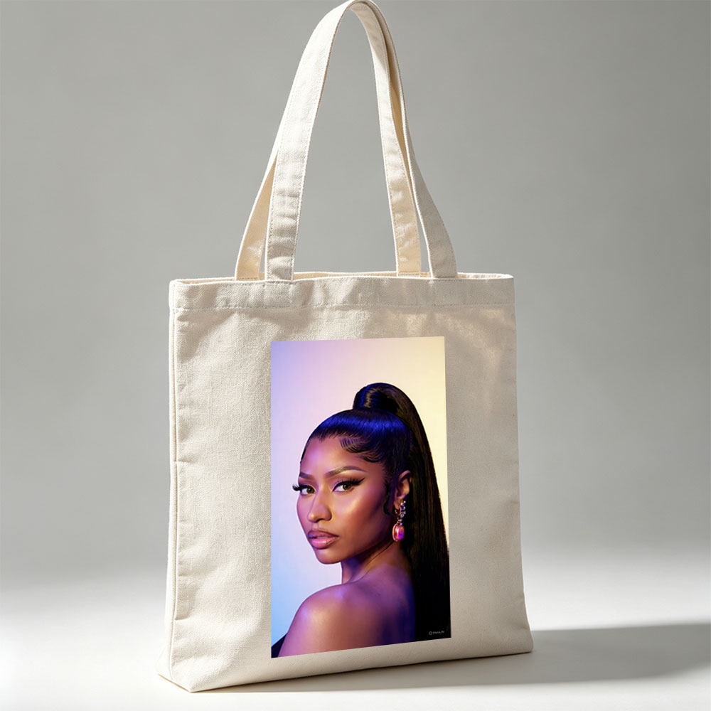 Nicki Minaj in a Stunning Portrait with Bold Makeup and High Ponytail Under Purple Lighting - Canvas tote bags