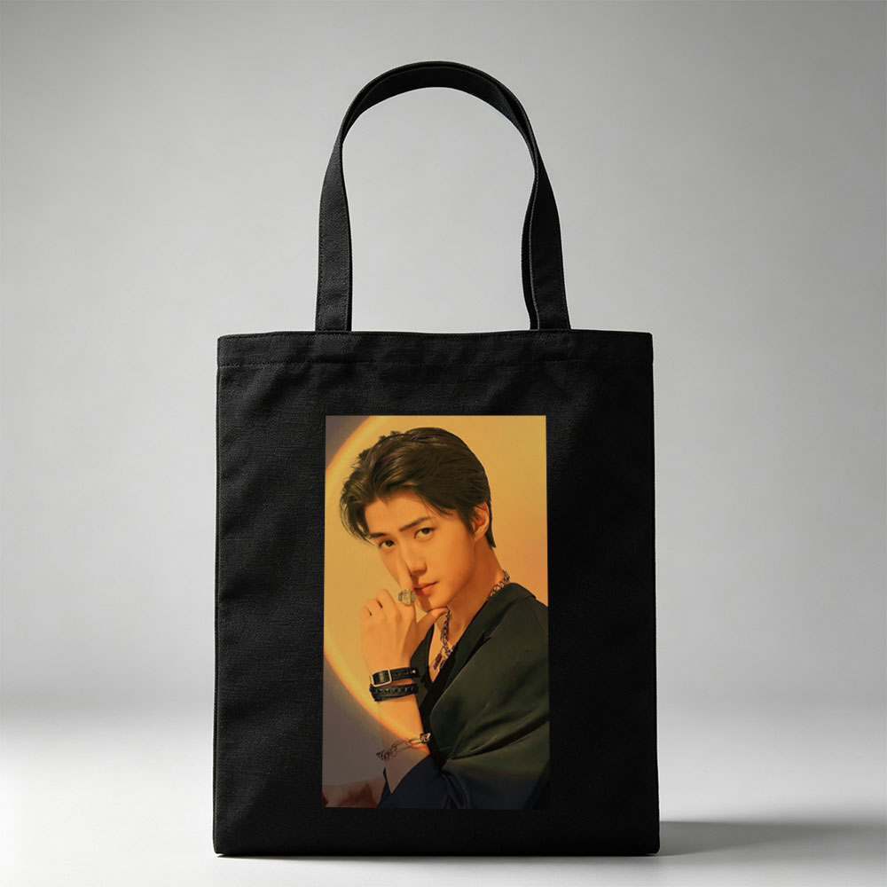Felix from Stray Kids in a Stylish Pose with Dramatic Lighting and Fashion Accessories - Canvas tote bags