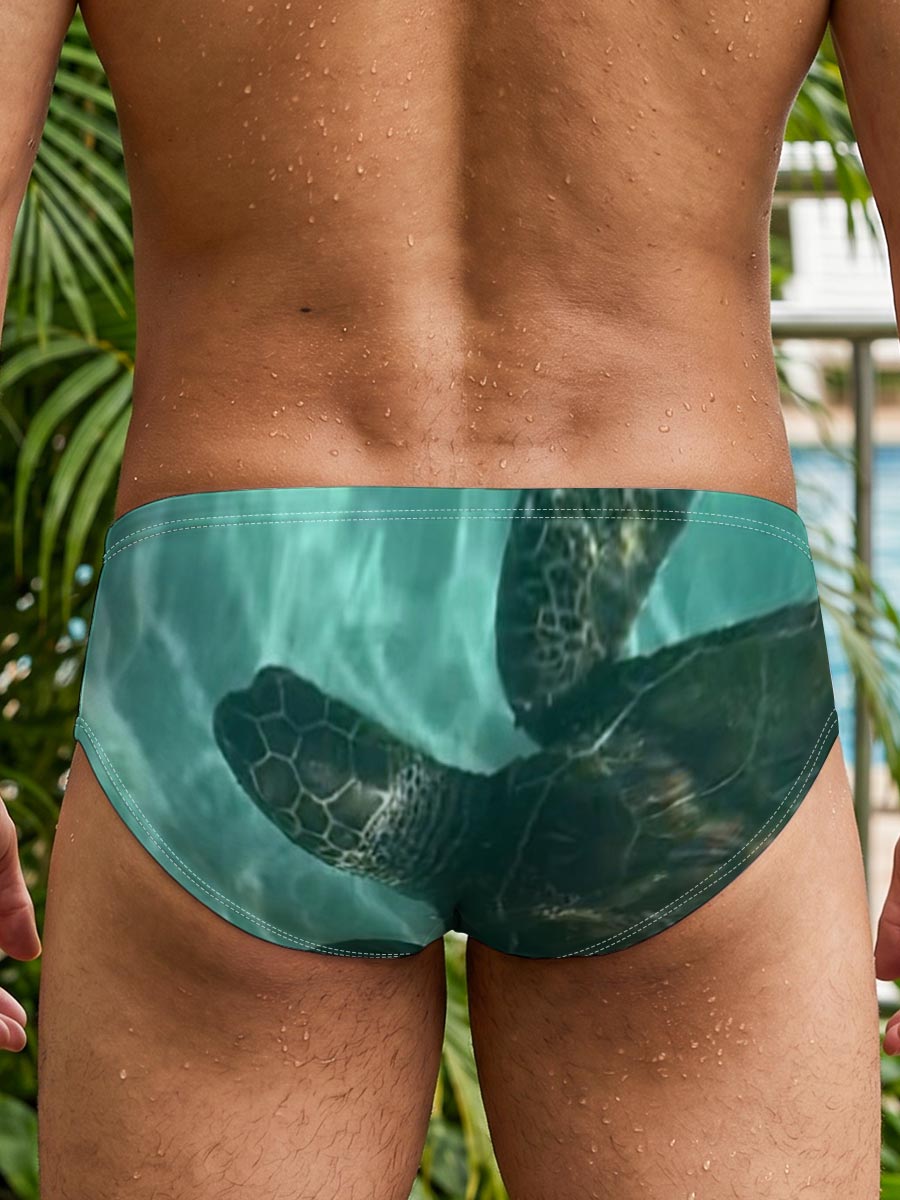 Sea Turtle Swimming Among Tropical Flowers in Clear Water -  Men's swim trunks