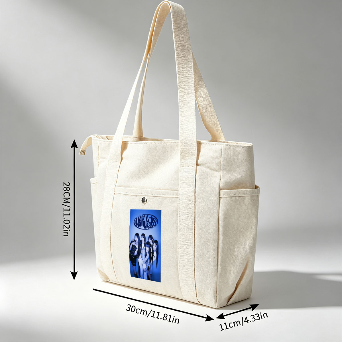 NewJeans Group Pose in Blue-Toned Studio Photo with Stylish Outfits and Confident Expressions - Multi-pocket bags