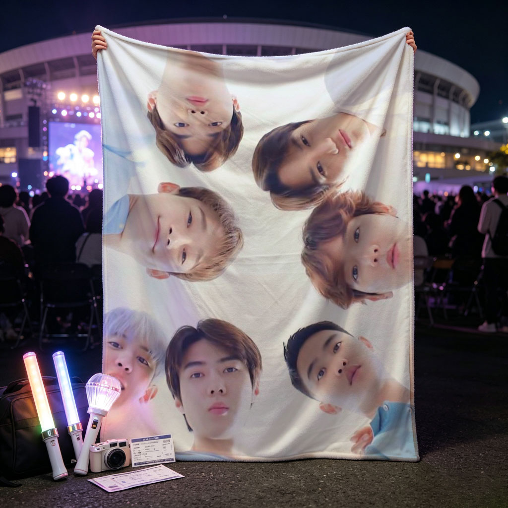 NCT Dream Members in a Circular Formation Wearing Light Blue Outfits Against a Bright Sky Background - Blankets