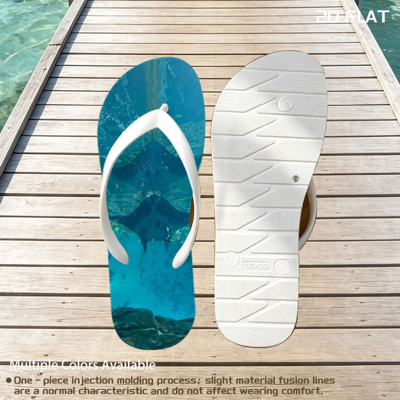 Graceful manta rays glide through clear blue waters, their silhouettes dancing beneath the surface. -  flip-flops