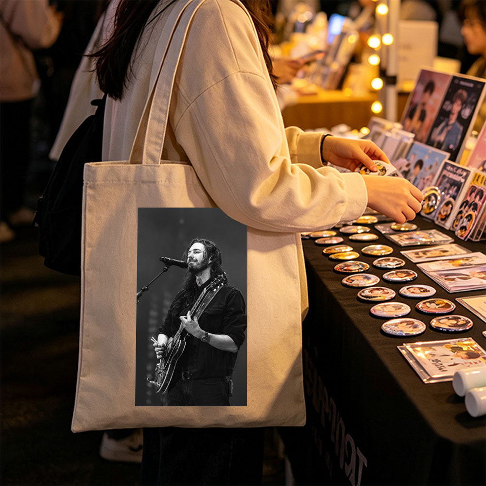 Hozier Performing Live on Stage with Electric Guitar and Microphone - Canvas tote bags