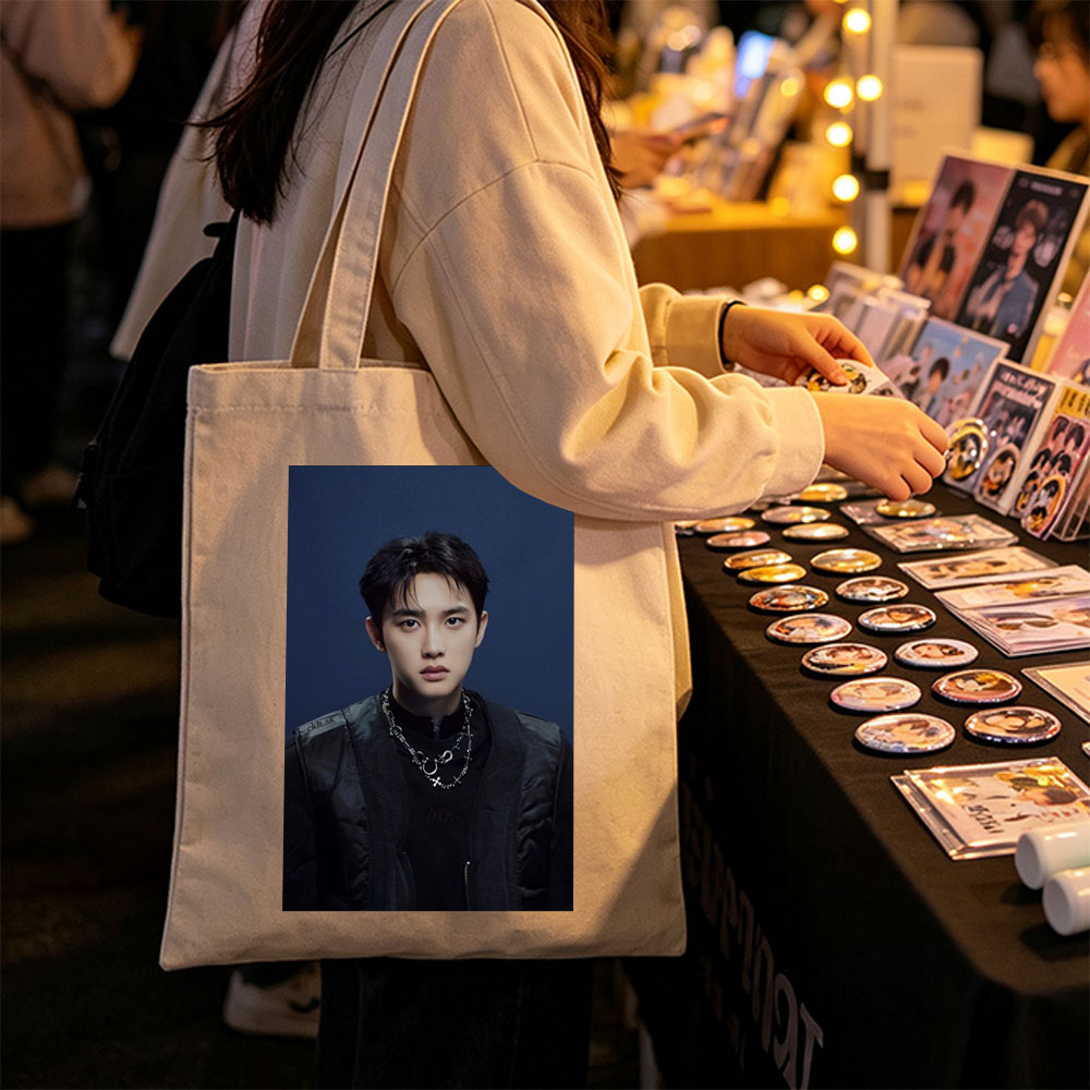 Do Kyung Soo in a Stylish Black Outfit with Layered Necklaces Against a Dark Blue Background - Canvas tote bags